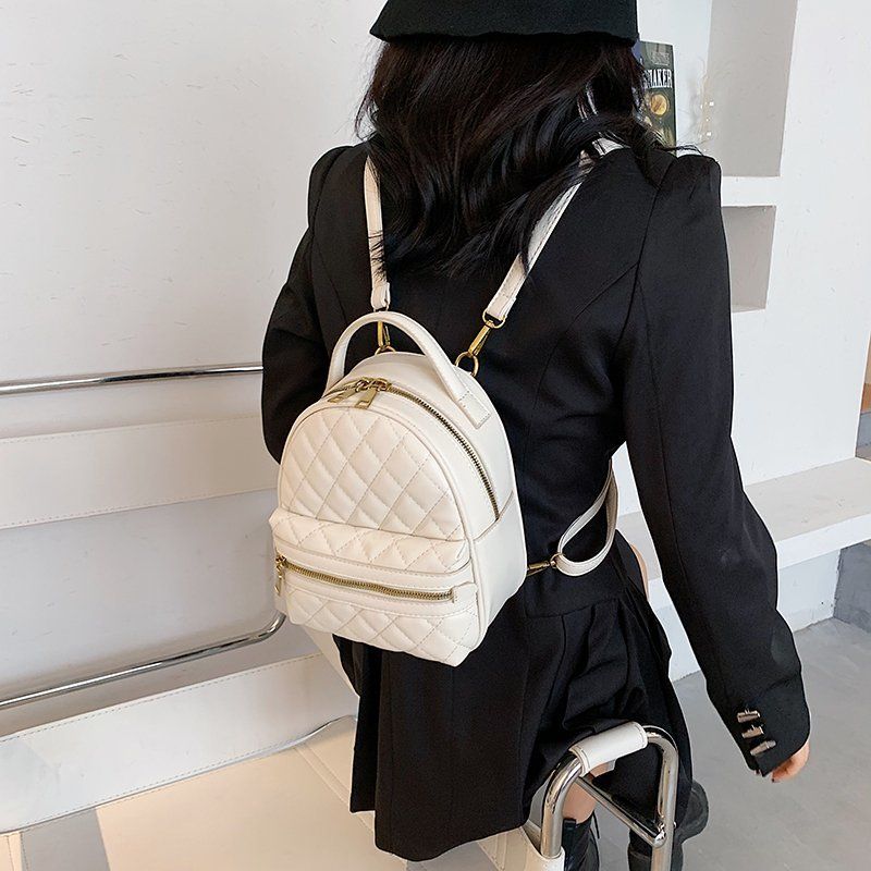 sac à dos femme en tissu à carreaux