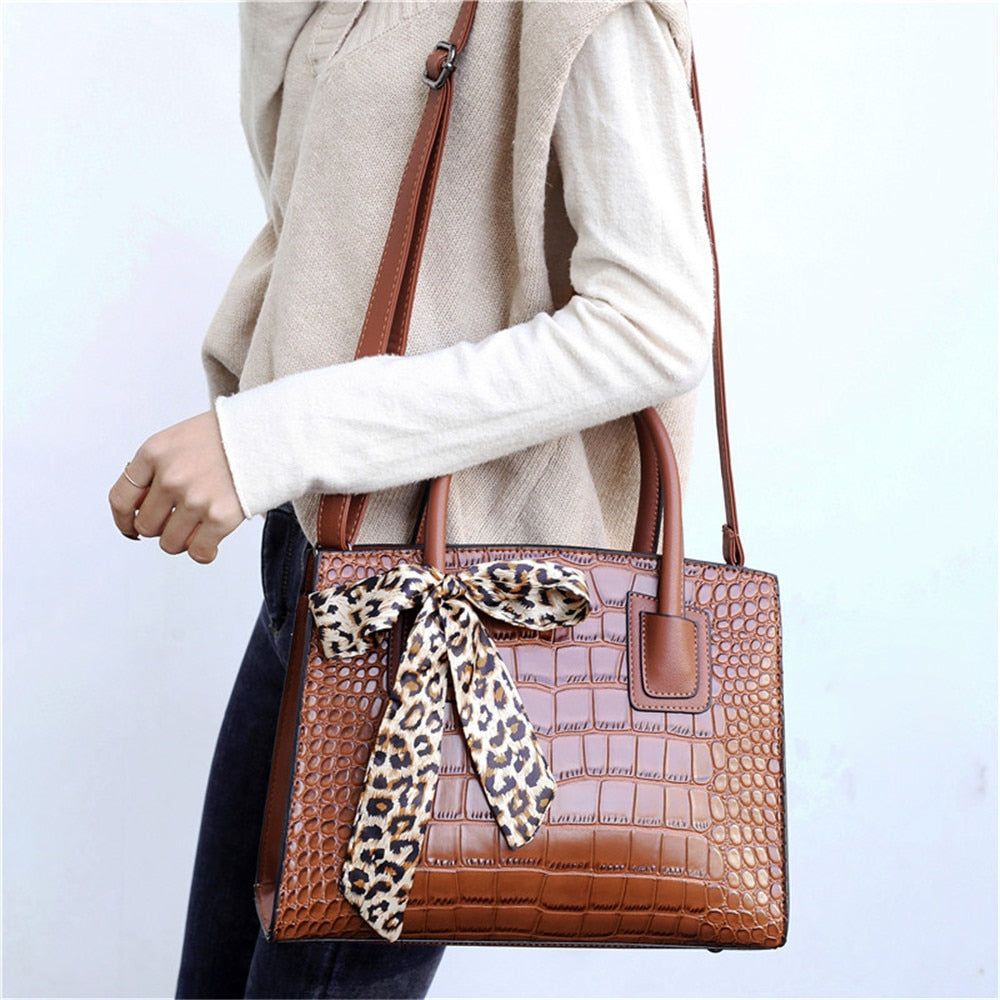 sac à main petit format léopard