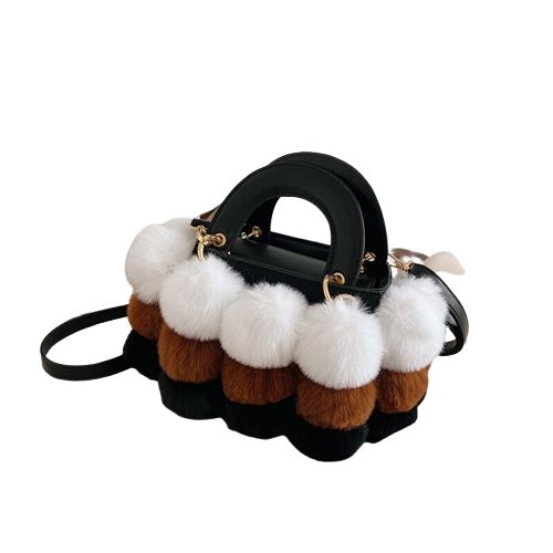 sac a main pompon en cuir
